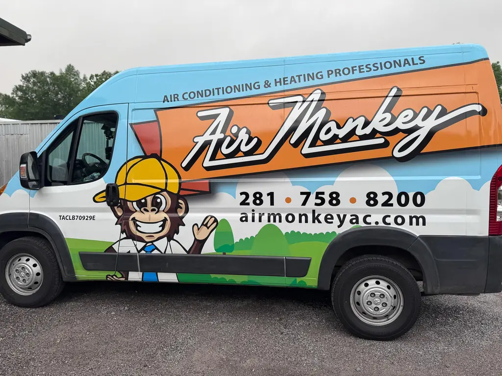 The Air Monkey service van, liveried with the company mascot and Texas licence TACLB70929E